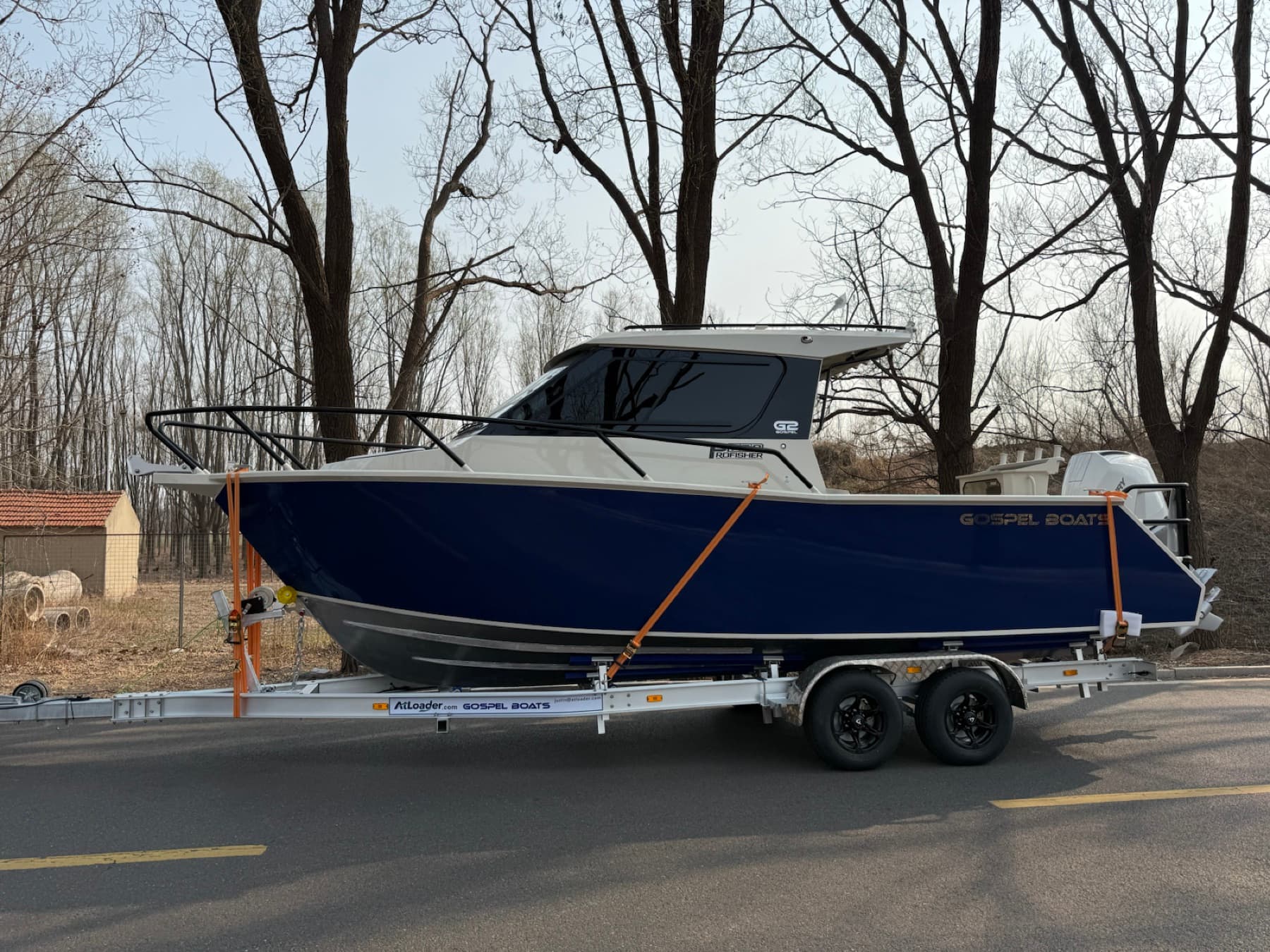 Side profile of a boat carried on an ATLL860 example trailer